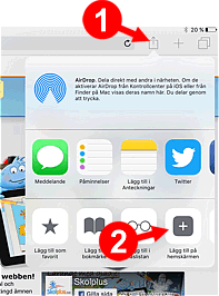 Bilden visar en person som skriver på en bärbar dator vid ett träbord utomhus.